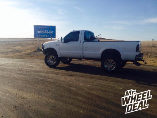 20x12" Moto Metal 962 Chrome Wheels with 35X12.50R20 Nitto Trail Grappler Tires on a 1999 Ford F-350 20x12" Moto Metal 962 Chrome Wheels with 35X12.50R20 Nitto Trail Grappler Tires on a 1999 Ford F-350