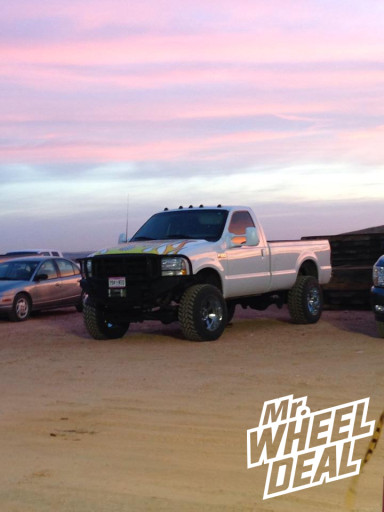 20x12" Moto Metal 962 Chrome Wheels with 35X12.50R20 Nitto Trail Grappler Tires on a 1999 Ford F-350 20x12" Moto Metal 962 Chrome Wheels with 35X12.50R20 Nitto Trail Grappler Tires on a 1999 Ford F-350