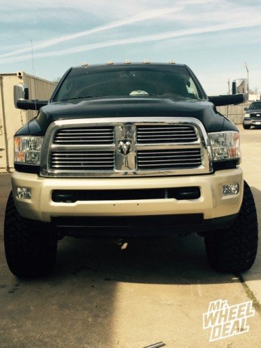 22x12 Fuel Renegade Black and Milled wheels with 37X13.50R22 Black Bear MT tires on a 2012 Ram 2500 2012 Ram 2500 with 22x12 Black and Milled Fuel Renegade wheels and 37X13.50R22 Black Bear MT tires