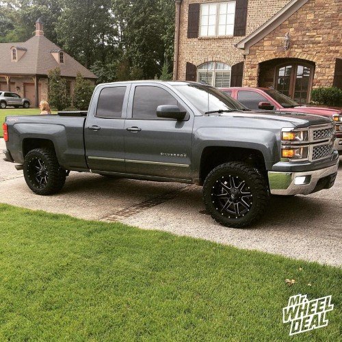 2014 Chevy Silverado 1500 with 20x10 Fuel Offroad Maverick -12mm wheels and LT295/55/20 Nitto Trail Grappler MT tires 20x10 Fuel Maverick -12mm wheels with LT295/55/20 Nitto Trail Grappler MT tires on a 2014 Chevy Silverado 1500