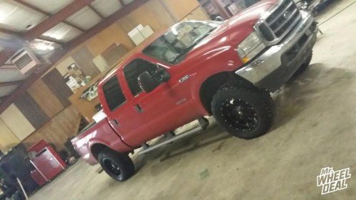 20x10 Fuel Hostage wheels -24 offset with 35x12.50R20 Cooper STT tires on a 2004 Ford F350 2004 F350 with 20x10 Fuel Offroad Hostage wheels -24 offset and 35x12.50R20 Cooper STT tires