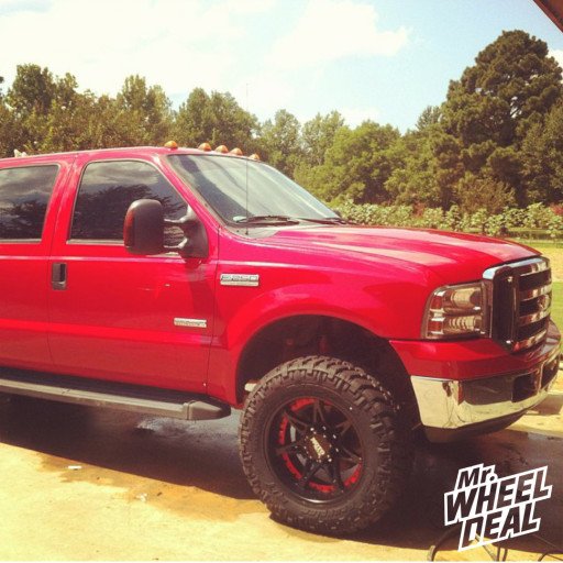 2006 Ford F-250 with 20" Moto Metal 961 Black wheels and 35" Nitto Trail Grappler tires 20x10 Moto Metal 961 Black wheels with 35X12.50R20 Nitto Trail Grappler tires on a 2006 Ford F-250