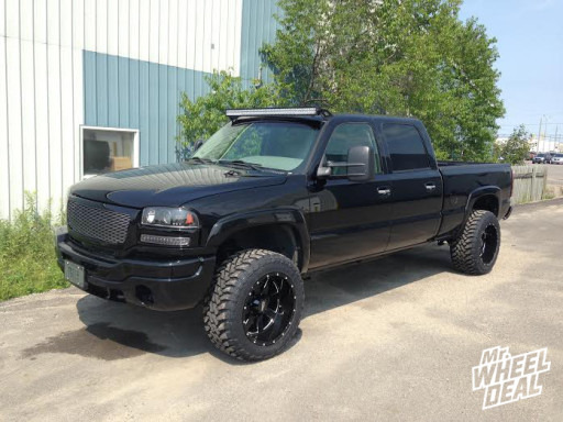 2007 GMC Sierra 2500 with Moto Metal 962 Wheels and Toyo Open Country MT Tires Moto Metal 962 Wheels with Toyo Open Country MT Tires on a 2007 GMC Sierra 2500
