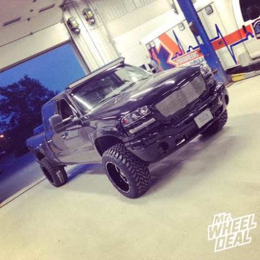 20x12 Moto Metal 962 Black Wheels with 33x12.50x20 Toyo Open Country MT Tires on a 2007 GMC Sierra 2500 2007 GMC Sierra 2500 with 20x12 Moto Metal 962 Black Wheels with 33x12.50x20 Toyo Open Country MT Tires