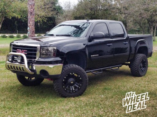 20x10" XD Monster Black Wheels with LT35x12.50x20 Toyo Open Country MT Tires on a 2011 GMC Sierra 1500 20x10" XD Monster Black Wheels with LT35x12.50x20 Toyo Open Country MT Tires on a 2011 GMC Sierra 1500