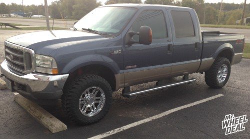 2004 Ford F-250 with 18x9" Moto Metal 951 Chrome wheels and 33X12.50R18 Toyo Open Country MT tires 18" Moto Metal 951 Chrome wheels with 33" Toyo Open Country MT tires on a 2004 Ford F250