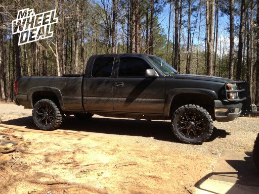 20x9" Fuel Maverick Wheels with 33x12.50x20 Nitto Mud Grappler Tires on a 2003 Chevy Silverado 2500HD