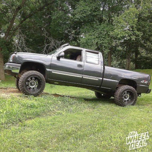 2003 Chevy Silverado 1500 with 20x12 Black XD Series Riot wheels and 35X12.50R20 Federal Couragia MT tires 20x12" Black XD Riot wheels with 35X12.50R20 Federal Couragia MT tires on a 2003 Chevy Silverado 1500