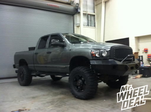 18x9" XD Rockstar Black Wheels with 37x13.50x18 Nitto Mud Grappler Tires on a 2007 Ram 2500 18x9" XD Rockstar Black Wheels with 37x13.50x18 Nitto Mud Grappler Tires on a 2007 Ram 2500