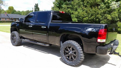 2012 GMC Sierra 2500 HD with 20x9 Black Fuel Maverick wheels and 35x12.50x20 Nitto Mud Grappler tires 20x9" Black Fuel Offroad Maverick wheels with 35x12.50x20 Nitto Mud Grappler tires on a 2012 GMC Sierra 2500 HD