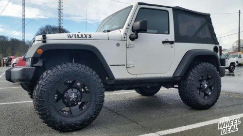2015 Jeep Wrangler Sport with a 3.5" Lift with 17x9" XD Rockstar wheels and 35X12.50R17 Nitto Trail Grappler tires 17x9 KMC XD Rockstar wheels with 35X12.50R17 Nitto Trail Grappler tires on a 2015 Jeep Wrangler Sport with a 3.5" Lift