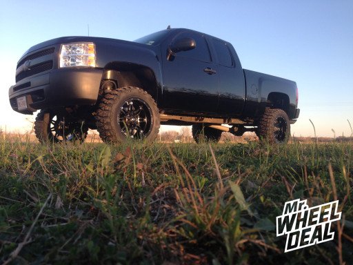 20x10" Fuel Off-Road Hostage Wheels with 33x12.50x20 Nitto Mud Grappler Tires on a 2013 Chevy Silverado 1500 20x10" Fuel Off-Road Hostage Wheels with 33x12.50x20 Nitto Mud Grappler Tires on a 2013 Chevy Silverado 1500