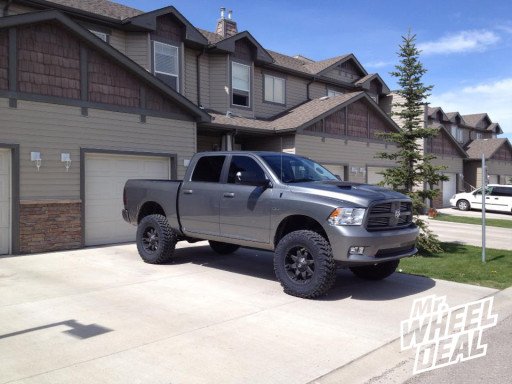 20x9" Fuel Off Road D509 Wheels 37x12.50x20 Nitto Trail Grappler Tires on a 2012 Dodge 1500