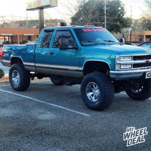 Chrome 18x10" Moto Metal 962 -24mm wheels with 38x13.50x18 Toyo Open Country M/T tires on a 1998 K-1500 18x10 Moto Metal 962 -24mm Chrome wheels with 38x13.50x18 Toyo Open Country M/T tires on a 1998 K-1500