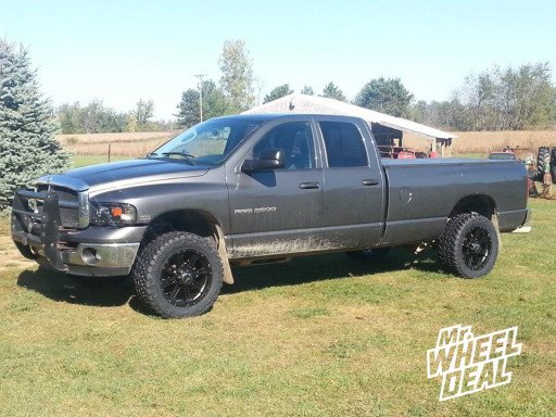 Raceline 981 Raptor Wheels with 295/55/20 Nitto Trail Grappler Tires on a 2003 Dodge Ram 2500