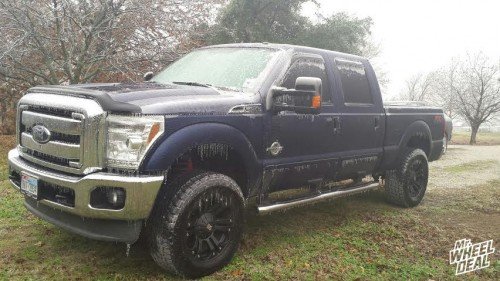 2012 Ford F-250 with 20x9 XD Monster Black +18mm wheels with LT295/60/20 Nitto Terra Grappler tires 20x9" KMC XD Monster Black +18mm wheels with LT295/60/20 Nitto Terra Grappler tires on a 2012 Ford F-250