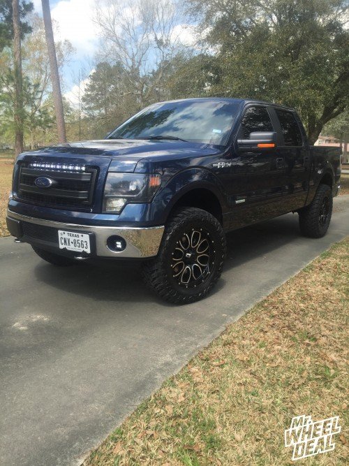 2013 F150 with 20x9 Helo 879 Gloss Black Machined wheels with 35x12.50x20 Atturo Trail Blade MT tires 20x9 Helo 879 Gloss Black Machined wheels with 35x12.50x20 Atturo Trail Blade MT tires on a 2013 Ford F-150