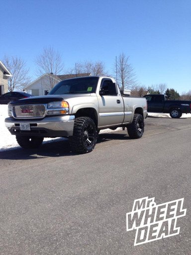 20x10" XD Monster Black Wheels with 33x12.50x20 Nitto Grappler Mud Tires on a 2001 GMC Sierra 1500 20x10" XD Monster Black Wheels with 33x12.50x20 Nitto Grappler Mud Tires on a 2001 GMC Sierra 1500