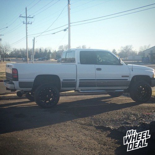 1999 Ram 2500 with 20x12" Moto Metal 962 Black wheels and 305/50/20 Nitto NT420S tires 20x12 Moto Metal 962 Black wheels with 305/50/20 Nitto NT420S tires on a 1999 Ram 2500