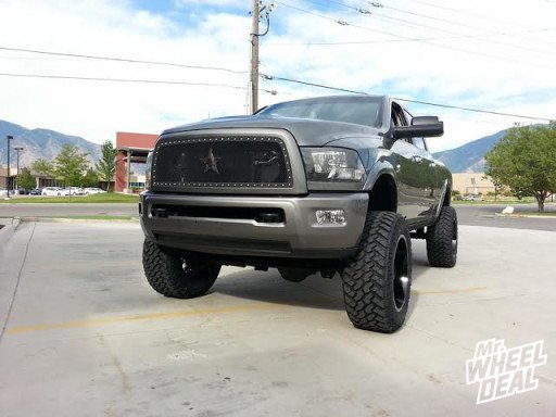 2011 Ram with 22x12 Fuel Maverick Wheels with 37x13.50x22 Nitto Trail Grappler Tires 22x12" Fuel Off-Road Maverick Wheels with 37x13.50x22 Nitto Trail Grappler Tires on a 2011 Ram 2500