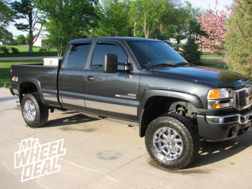 18x9" XD Badland Chrome Wheels with LT 285/65/18 Toyo Open Country AT II Tires GMC