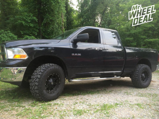 2009 RAM 1500 with 17x9 Fuel Hostage Wheels with 35X12.50R17 Fierce Attitude MT Tires 17x9 Fuel Off-Road Hostage Wheels with 35X12.50R17 Fierce Attitude MT Tires on a 2009 RAM 1500