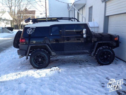Black 16x8 Raceline 981 Raptor wheels with LT285/75/16 General Grabber AT2 tires on a 2007 FJ Cruiser 16x8" Raceline 981 Raptor Black wheels with LT285/75/16 General Grabber AT2 tires on a 2007 FJ Cruiser