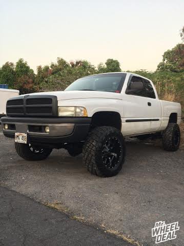 2002 Ram 2500 with Black 18x10 Moto Metal 970 wheels -24 offset 18x10" Black Moto Metal 970 wheels -24 offset on a 2002 Ram 2500