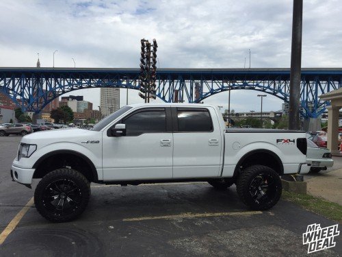 35x12.50x22 Atturo Trail Blade tires with 22x12 Hostile Hammered Blade Cut wheels on a 2009 Ford F-150 22x12 Hostile Hammered Blade Cut wheels with 35x12.50x22 Atturo Trail Blade tires on a 2009 Ford F-150