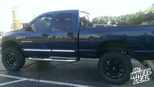 18" Moto Metal 962 Black Wheels with 35x12.50x18 Tuff MT Tires on a 2007 Dodge Ram 1500