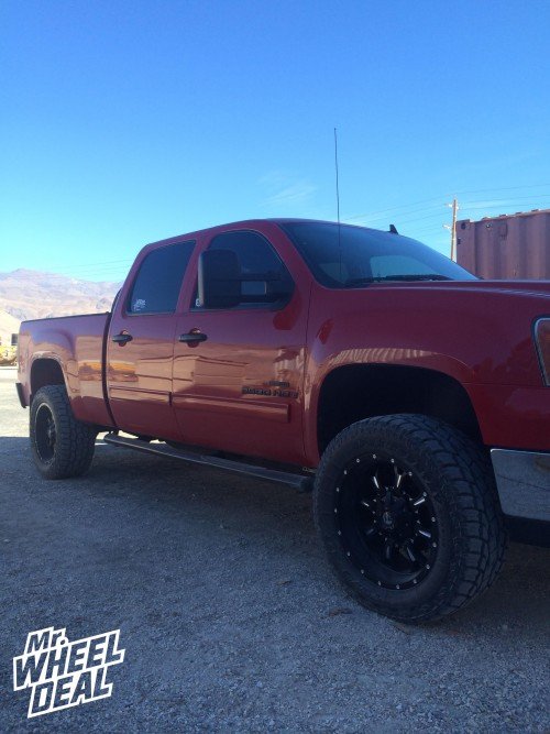 2008 GMC Sierra 2500 with 20x10" Fuel Krank Black Milled wheels and LT305/55/20 Toyo Open Country A/T II tires 20x10 Fuel Off-Road Krank Black Milled wheels with LT305/55/20 Toyo Open Country A/T II tires on a 2008 GMC Sierra 2500