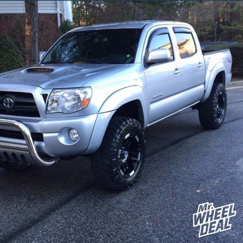 18x9" Black Moto Metal 951 -12 offset with 285/65/18 Nitto Trail Grappler MT tires on a 2006 Toyota Tacoma Pre-Runner 6Lug 2006 Toyota Tacoma Pre-Runner 6Lug with 18x9 Moto Metal 951 Black -12 offset and 285/65/18 Nitto Trail Grappler MT tires