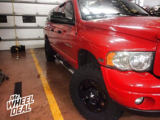 17x9" XD Rockstar Black Wheels with 35x12.50x17 Federal Couragia MT Tires on a 2004 Dodge Ram 17x9" XD Rockstar Black Wheels with 35x12.50x17 Federal Couragia MT Tires on a 2004 Dodge Ram