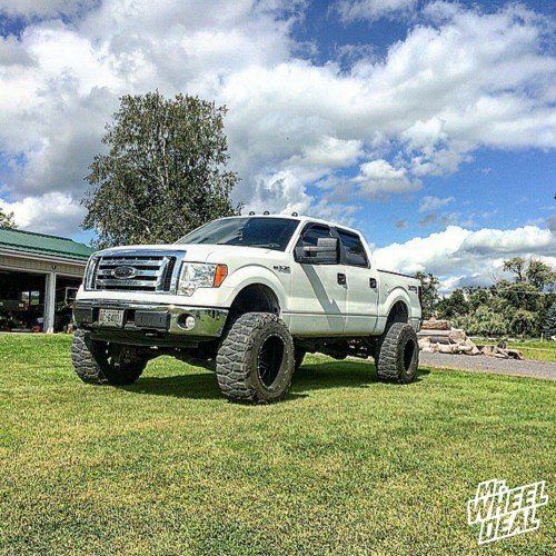 2009 Ford F-150 with 20x14 Fuel Maverick 2 Piece Black Milled wheels and 37x13.50x20 Nitto Mud Grappler tires 20x14" Fuel Maverick Black Milled wheels with 37x13.50x20 Nitto Mud Grappler tires on a 2009 Ford F-150