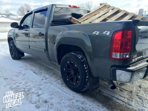 18x9 Black Tuff T01 wheels with 25mm offset and 285/60/18 Bridgestone DM-V1 Blizzak tires on a 2011 Sierra 1500 18x9" Tuff T01 Black wheels with 25mm offset and 285/60/18 Bridgestone DM-V1 Blizzak tires on a 2011 Sierra 1500