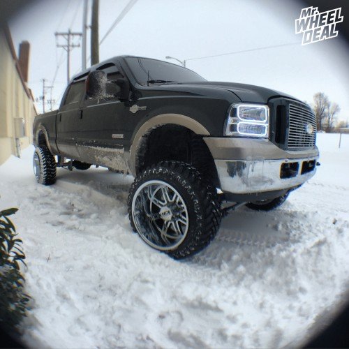 2005 Ford F-250 with 22x14" Ion style 183 Chrome wheels with 35x12.50x22 Atturo Trail Blade MT tires 22x14 Ion style 183 Chrome wheels with 35x12.50x22 Atturo Trail Blade MT tires on a 2005 Ford F-250