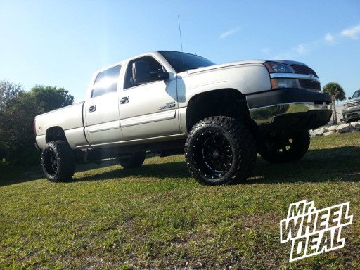 20x12" Moto Metal 962 Black Wheels with 35x12.50x20 Federal Couragia MT Tires on a 2004 Chevy 2500HD 20x12" Moto Metal 962 Black Wheels with 35x12.50x20 Federal Couragia MT Tires on a 2004 Chevy 2500HD