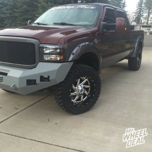 2007 Ford F-250 with 20x12 Fuel Renegade Black and PVD Chrome and 35x12.50x20 Atturo Trail Blade MT tires 20x12 Black and PVD Chrome Fuel Renegade with 35x12.50x20 Atturo Trail Blade MT tires on a 2007 Ford F250
