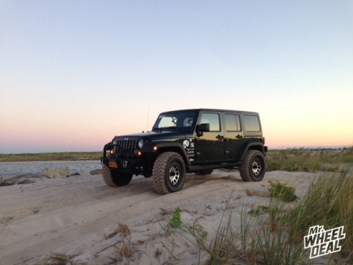 2011 Jeep Wrangler with 17x8.5 Method NV Machined wheels and LT315/70/17 Mickey Thompson MTZ tires 17x8.5 Method NV Machined 0 offset wheels with LT315/70/17 Mickey Thompson MTZ tires on a 2011 Jeep Wrangler