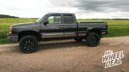 20x10" Eagle Alloy 511 Wheels with 305/55/20 Trail Grappler Tires on a 2005 Chevy Silverado 1500