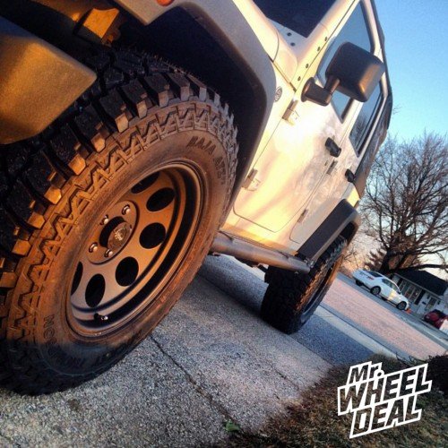 17x9 Flat Black Pro Comp Alloy 7069 wheels with LT285/70/17 Mickey Thompson Baja ATZP3 tires on a 2012 Jeep Wrangler 2012 Jeep Wrangler with 17x9 Pro Comp Alloy 7069 Flat Black wheels and LT285/70/17 Mickey Thompson Baja ATZP3 tires