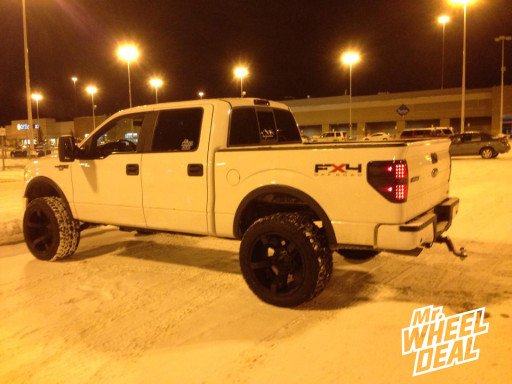 22x12" XD Rockstar II Black Wheels with 325/50/22 Toyo Open Country AT II Tires on a 2010 Ford F-150 22x12" XD Rockstar II Black Wheels with 325/50/22 Toyo Open Country AT II Tires on a 2010 Ford F-150