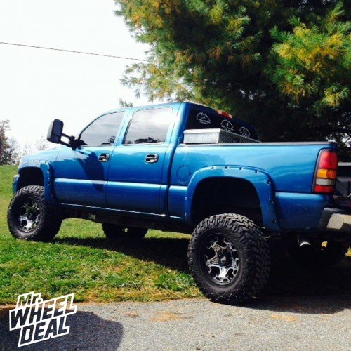 2004 GMC 1500 with 18x9 Moto Metal 909 -12mm wheels and 285/65/18 Nitto Trail Grappler MT tires 18x9" Moto Metal 909 wheels with 285/65/18 Nitto Trail Grappler MT tires on a 2004 GMC 1500