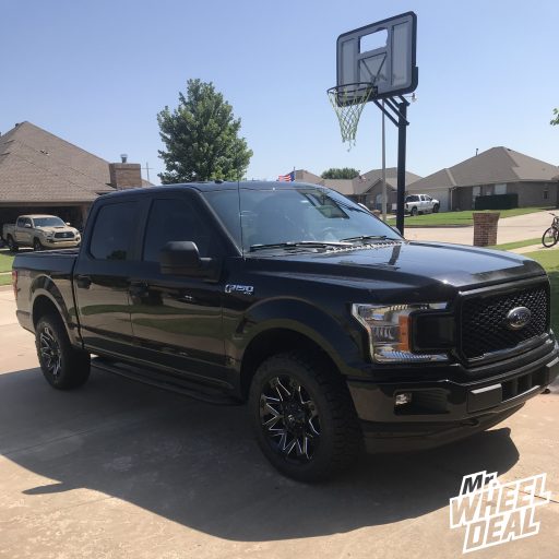 20x9" Fuel Offroad Ambush 20mm Black Milled wheels with LT275/55R20 Nitto Ridge Grappler tires on a 2018 Ford F-150