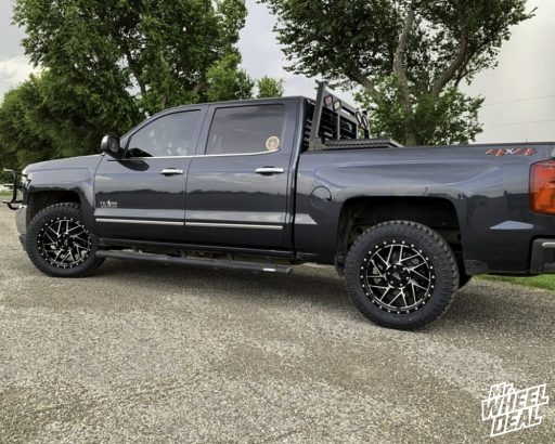 2018 Chevy Silverado 1500 with 20x9 Moto Metal MO985 +18mm Black wheels and LT285/55R20 Atturo Trail Blade XT tires
