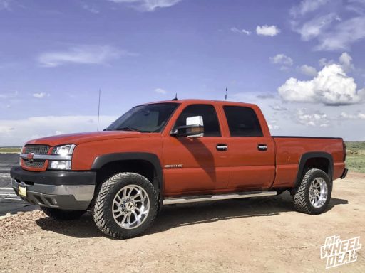 2004 Chevy Silverado 2500 with 20x10 Hostile Demon -19mm Chrome wheels and LT33X12.50R20 Fuel Mud Gripper tires
