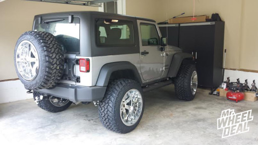 22x14" Moto Metal 962 Chrome Wheels with LT325/50/22 Nitto Trail Tires on a 2014 Jeep Wrangler 22x14" Moto Metal 962 Chrome Wheels with LT325/50/22 Nitto Trail Tires on a 2014 Jeep Wrangler