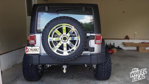 22x14 Moto Metal 962 Chrome Wheels with LT325/50/22 Nitto Trail Tires on a 2014 Jeep Wrangler 2014 Jeep Wrangler with 22x14 Moto Metal 962 Chrome Wheels with LT325/50/22 Nitto Trail Tires