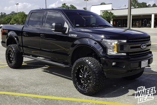20x10 -18mm Black Milled Fuel Cleaver wheels with 35x12.5R20LT Nitto Ridge Grappler tires on a 2018 Ford F-150