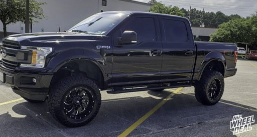 20x10" -18mm Black Milled Fuel Cleaver wheels with 35x12.5R20LT Nitto Ridge Grappler tires on a 2018 Ford F-150